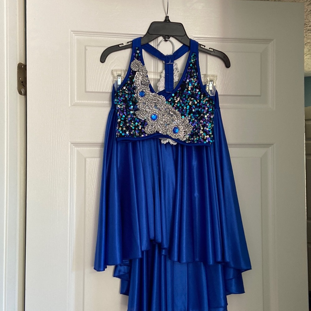 Beautiful beaded tank and skirt set. Skirt is high low cut. Very silky